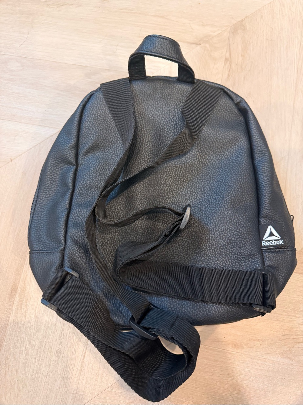Mini Reebok Black Pebbled Sling Backpack - Picture 2 of 3